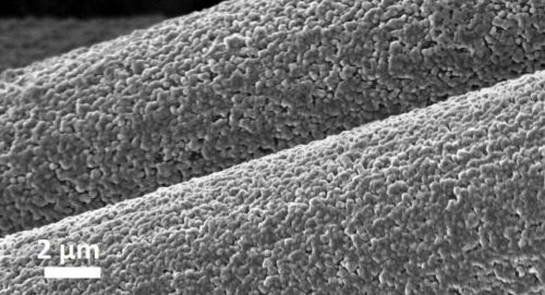 This magnified image shows aluminum deposited on carbon fibers in a battery electrode. The chemical bond makes the electrode thicker and its kinetics faster, resulting in a rechargeable battery that is safer, less expensive and more sustainable than lithium-ion batteries. Courtesy: Cornell University